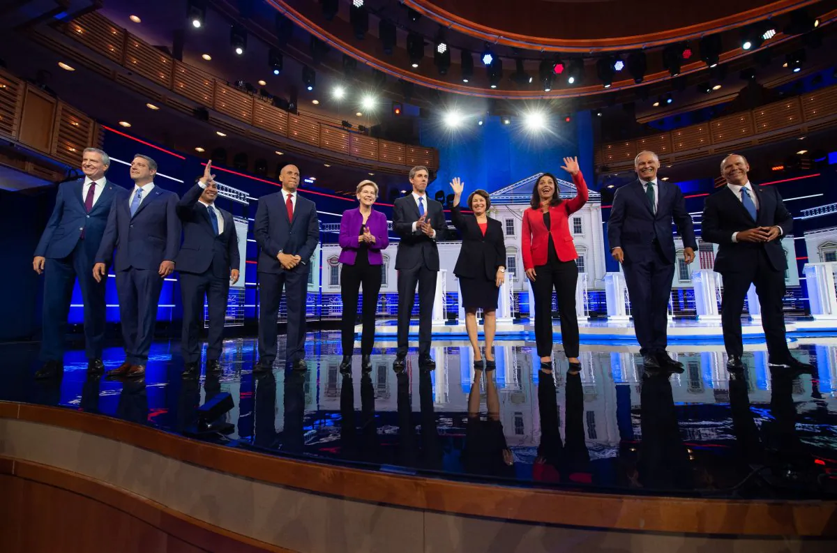 Democratic presidential hopefuls (fromL) Mayor of New York City Bill de Blasio, US Representative for Ohio's 13th congressional district Tim Ryan, former US Secretary of Housing and Urban Development Julian Castro, US Senator from New Jersey Cory Booker, US Senator from Massachusetts Elizabeth Warren, former US Representative for Texas' 16th congressional district Beto O'Rourke, US Senator from Minnesota Amy Klobuchar, US Representative for Hawaii's 2nd congressional district Tulsi Gabbard, Governor of Washington Jay Inslee and former US Representative for Maryland's 6th congressional district John Delaney participate in the first Democratic primary debate of the 2020 presidential campaign season hosted by NBC News at the Adrienne Arsht Center for the Performing Arts in Miami, FloridaaulAUL Loeb/AFP/Getty Images)