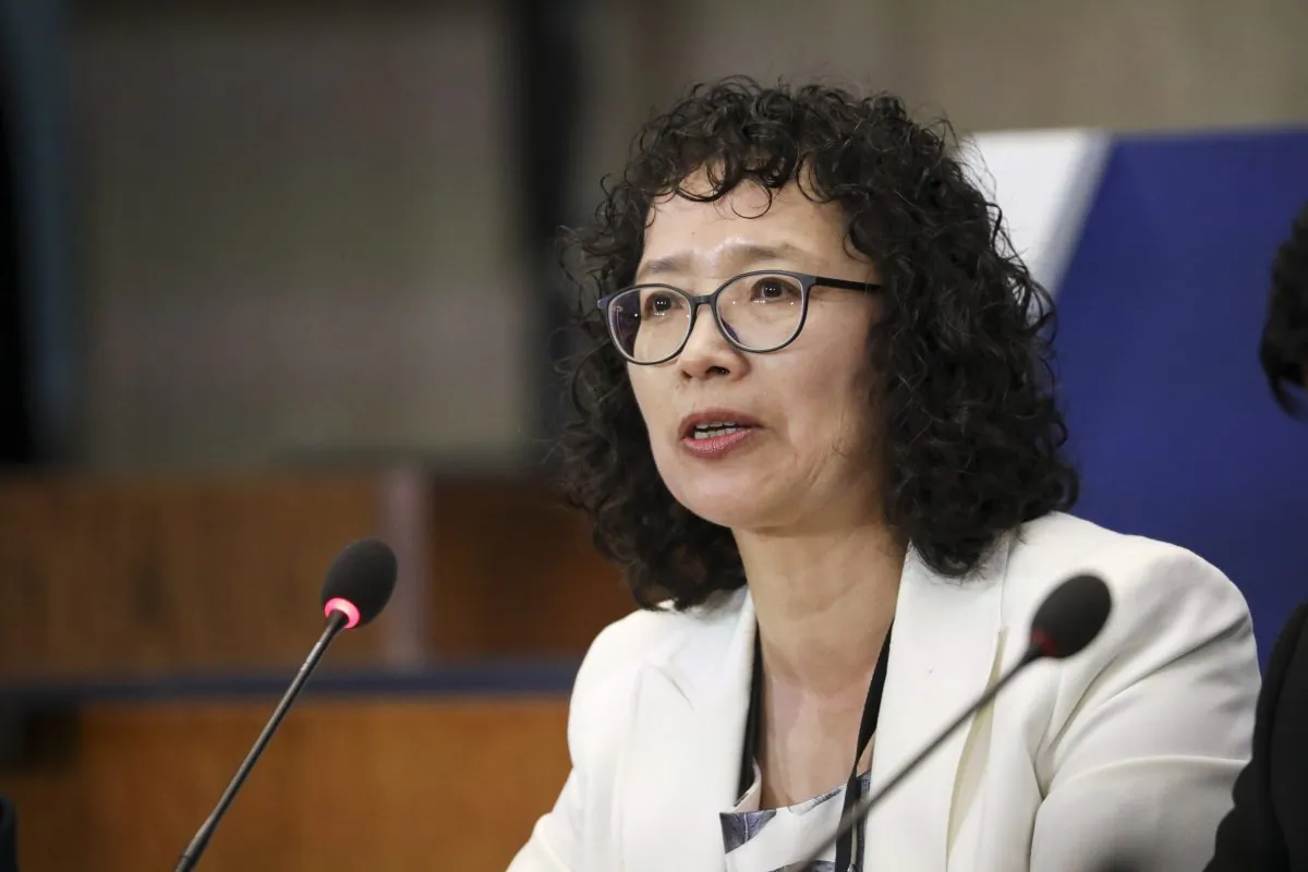 Yuhua Zhang, a Falun Gong practitioner who survived persecution in China, speaks at the Ministerial to Advance Religious Freedom at the Department of State in Washington on July 17, 2019. (Samira Bouaou/The Epoch Times)