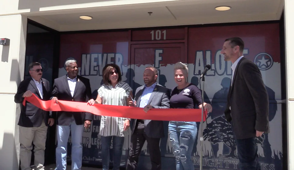 Mighty Oaks ribbon cutting ceremony for its new office opening in Murrieta, Calif. on May 9, 2019. Former US Congressman Allen West (2nd from the left), MOF founder Chad Robinchaux (4th from the left), Co-founder Kathy Robinchaux (5th from the left), and Jeremy (Courtesy of Mighty Oaks Foundation)