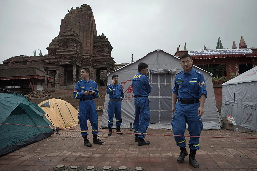 A Chinese rescue team stands outside their camp at the UNESCO world heritage site of Bhaktapur on the outskirts of the Nepalese capital Kathmandu on April 30, 2015. (Nicolas Asfouri/AFP/Getty Images)