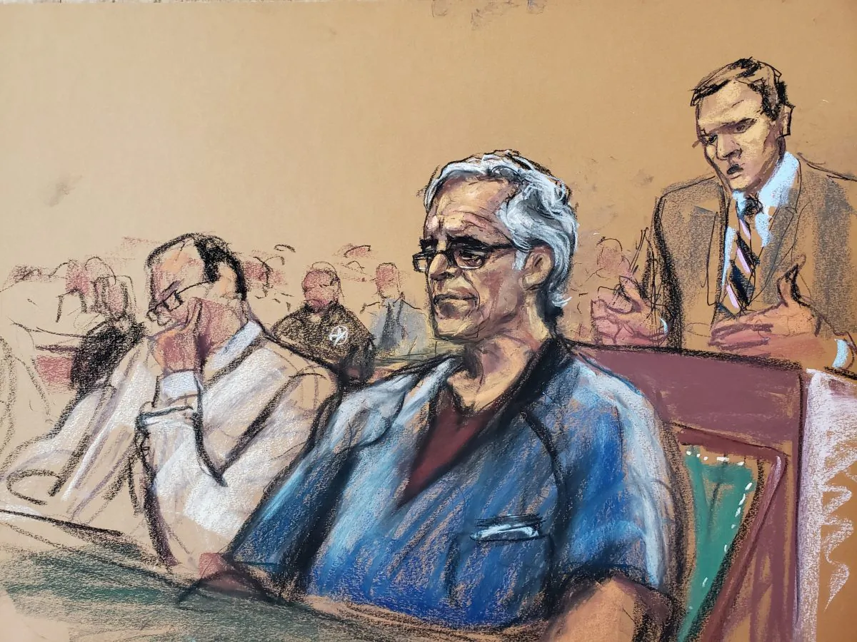 Assistant U.S. Attorney Alex Rossmiller (R) speaks as Jeffrey Epstein looks on during a a bail hearing in this court sketch in New York on July 15, 2019. (Jane Rosenberg/Reuters)