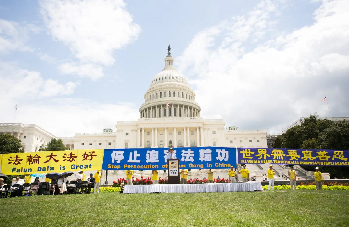 Falun Gong practitioners gathered for a rally on the anniversary of the Chinese regime's persecution of the spiritual discipline in Washington, on July 18, 2019. (Li Sha/The Epoch Times) 