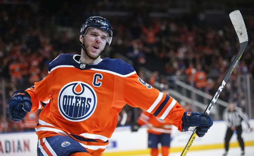 Edmonton Oilers' Connor McDavid celebrates his goal during second period NHL hockey action against the Ottawa Senators in Edmonton, March 23, 2019. (Jeff McIntosh/The Canadian Press)