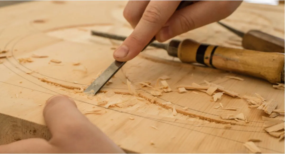 Stock photo of a carpenter at work. (Dominik Scythe / Unsplash)