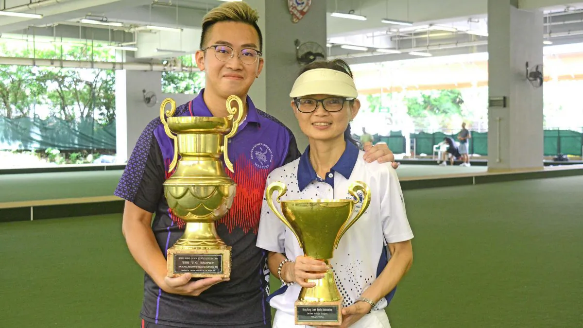(L-R) Craigengower Cricket Club bowler Jordi Lo and Shirley Ma from Hong Kong Football Club display their National Indoor Singles trophies after defeating their opponents in the finals last Saturday, July 13. (Stephanie Worth)