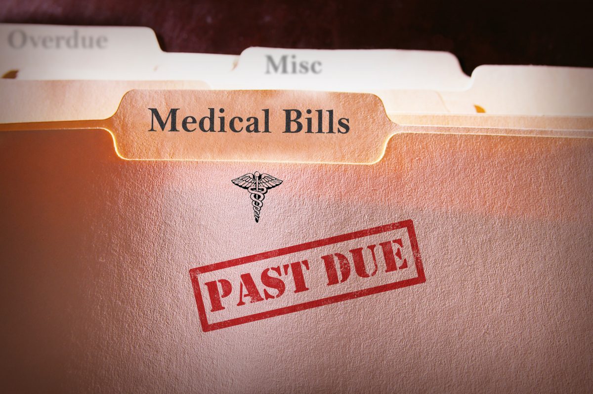 Churches are buying up medical debt for entire counties on its way to collection agencies and then forgiving it.(zimmytws/Shutterstock)