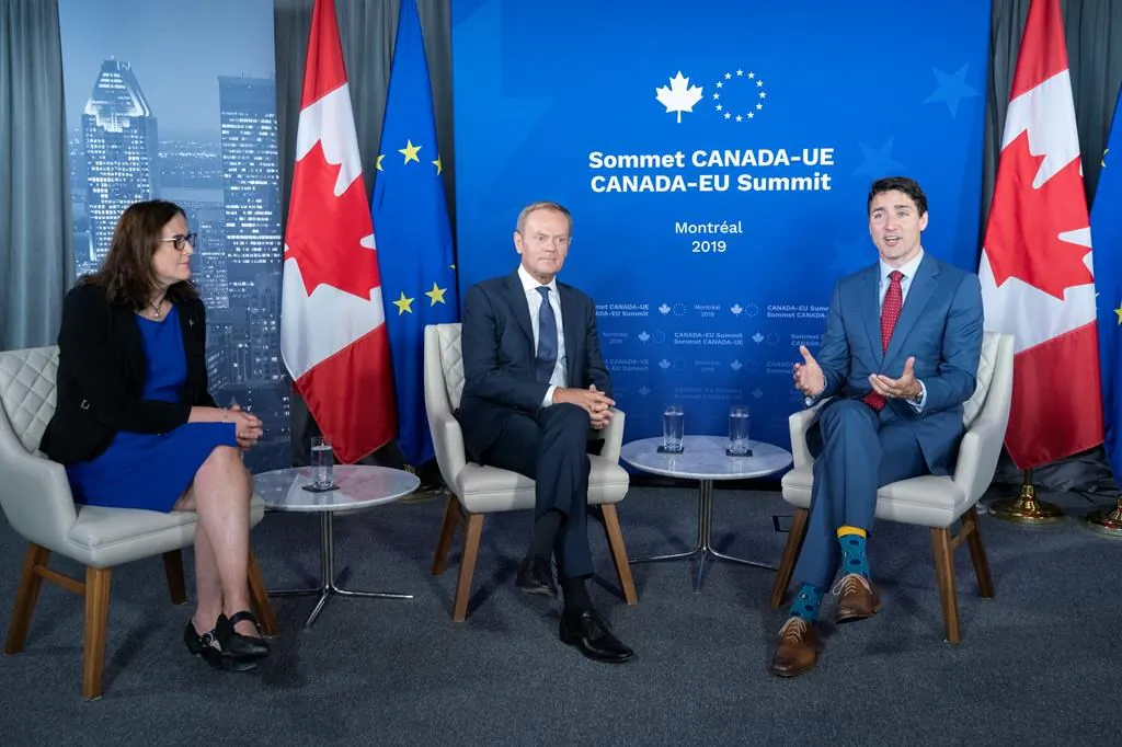 European Commissioner for Trade Cecilia Malmstrom and President of the European Council Donald Tusk listen to Prime Minister Justin Trudeau deliver remarks prior to a meeting in Montreal on July 18, 2019. (Paul Chiasson/The Canadian Press)
