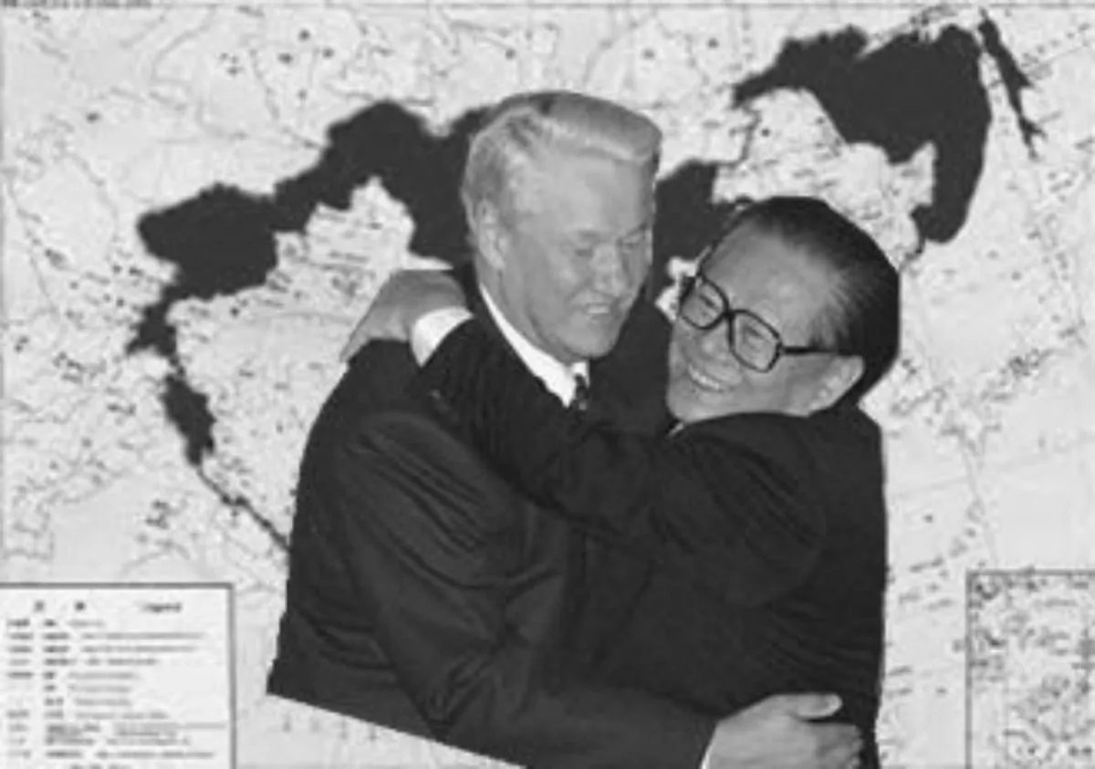 Then Russian President Boris Yeltsin, left, and then Chinese President Jiang Zemin hug each other after a joint press conference in Beijing's Great Hall of the People, Nov. 10, 1997. (Greg Baker/AP Photo)
