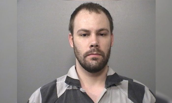 Brendt Christensen, 28, arrested in connection with the disappearance of Yingying Zhang, 26, on June 9, 2017, is shown in this booking photo in Champaign, Illinois, U.S., provided July 5, 2017. (Macon County Sheriff's Office/Handout via Reuters)