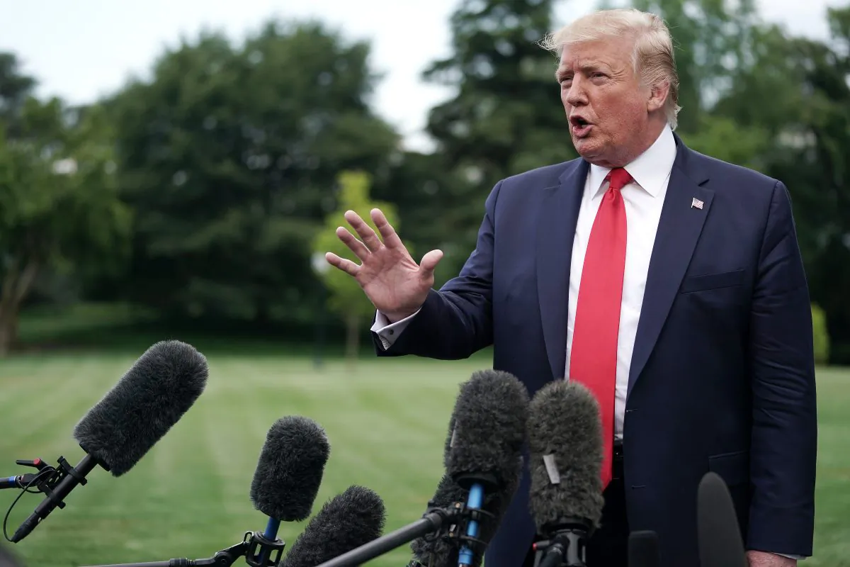 President Donald Trump talks to reporters as he departs the White House for a campaign rally in Washington on July 17, 2019. (Chip Somodevilla/Getty Images)