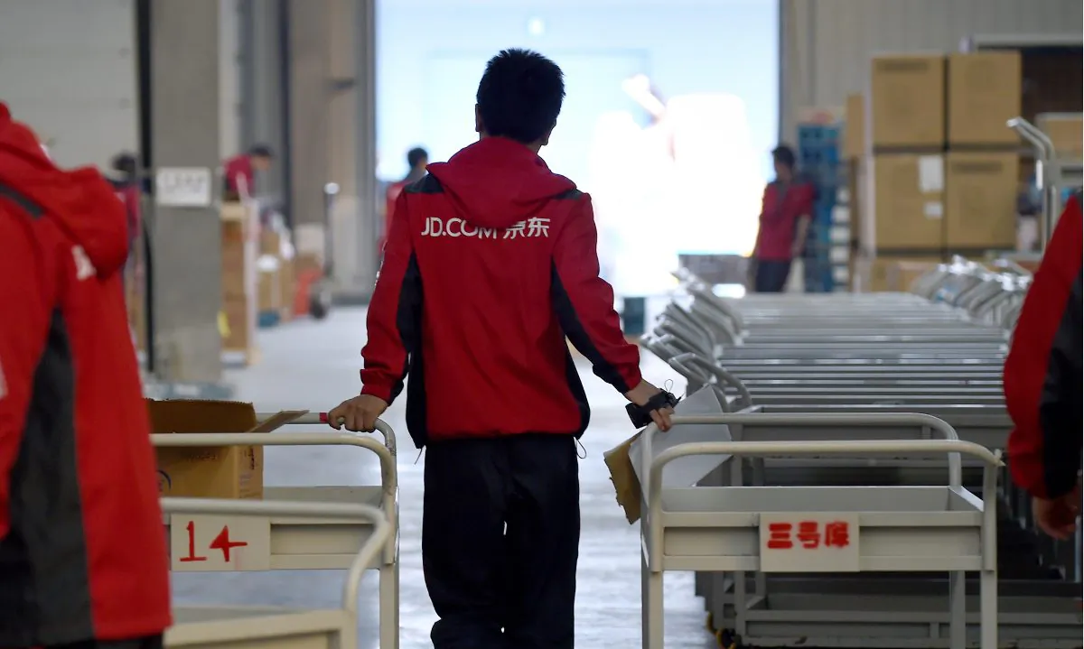 File photo of an employee working at Chinese online retailer JD.com (WANG ZHAO/AFP/Getty Images)