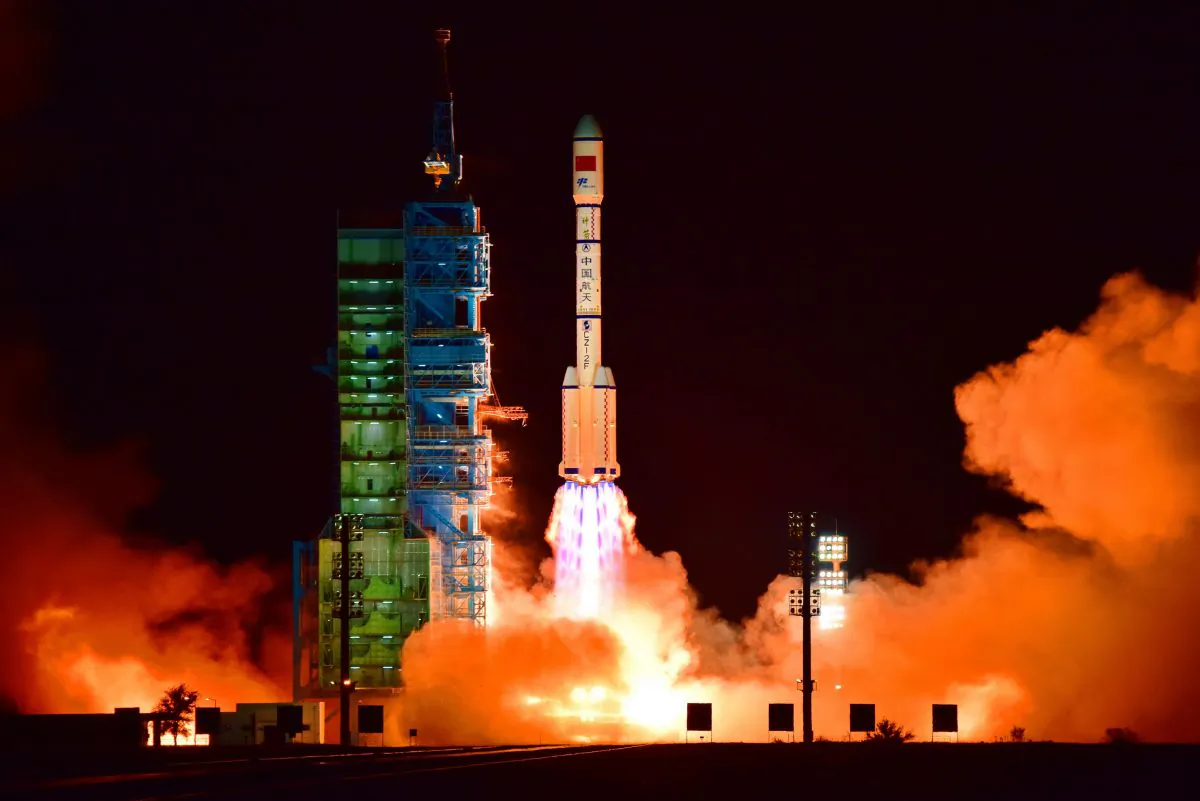 China's Tiangong 2 space lab is launched on a Long March-2F rocket from the Jiuquan Satellite Launch Center in the Gobi Desert, in China's Gansu province, on September 15, 2016. The space lab fell to Earth on July 19, 2019. 
9-/AFP/Getty Images)