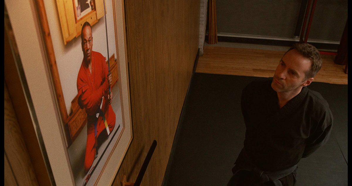 martial arts instructor and photo of sensei