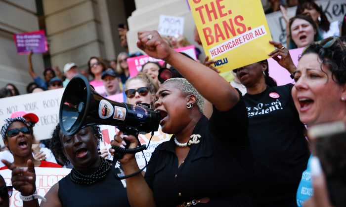 Georgia State Rep. Erica Thomas speaks during a protest at the Georgia State Capitol building in Atlanta, Georgia, on May 21, 2019. (Elijah Nouvelage/Getty Images)