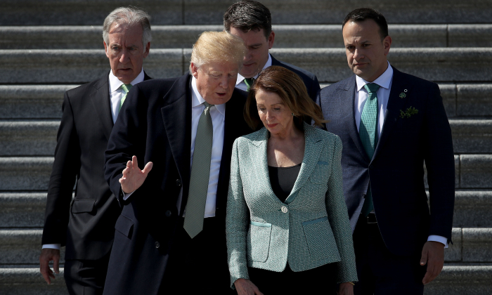WASHINGTON, DC - MARCH 14: U.S. President Donald Trump confers with Speaker of the House Nancy Pelosi (D-CA) while departing the U.S. Capitol following a St. Patrick's Day celebration on March 14, 2019 in Washington, DC. Also pictured (L-R) are Rep. Richard Neal (D-MA), and Irish Taoiseach Leo Varadkar. (Photo by Win McNamee/Getty Images)