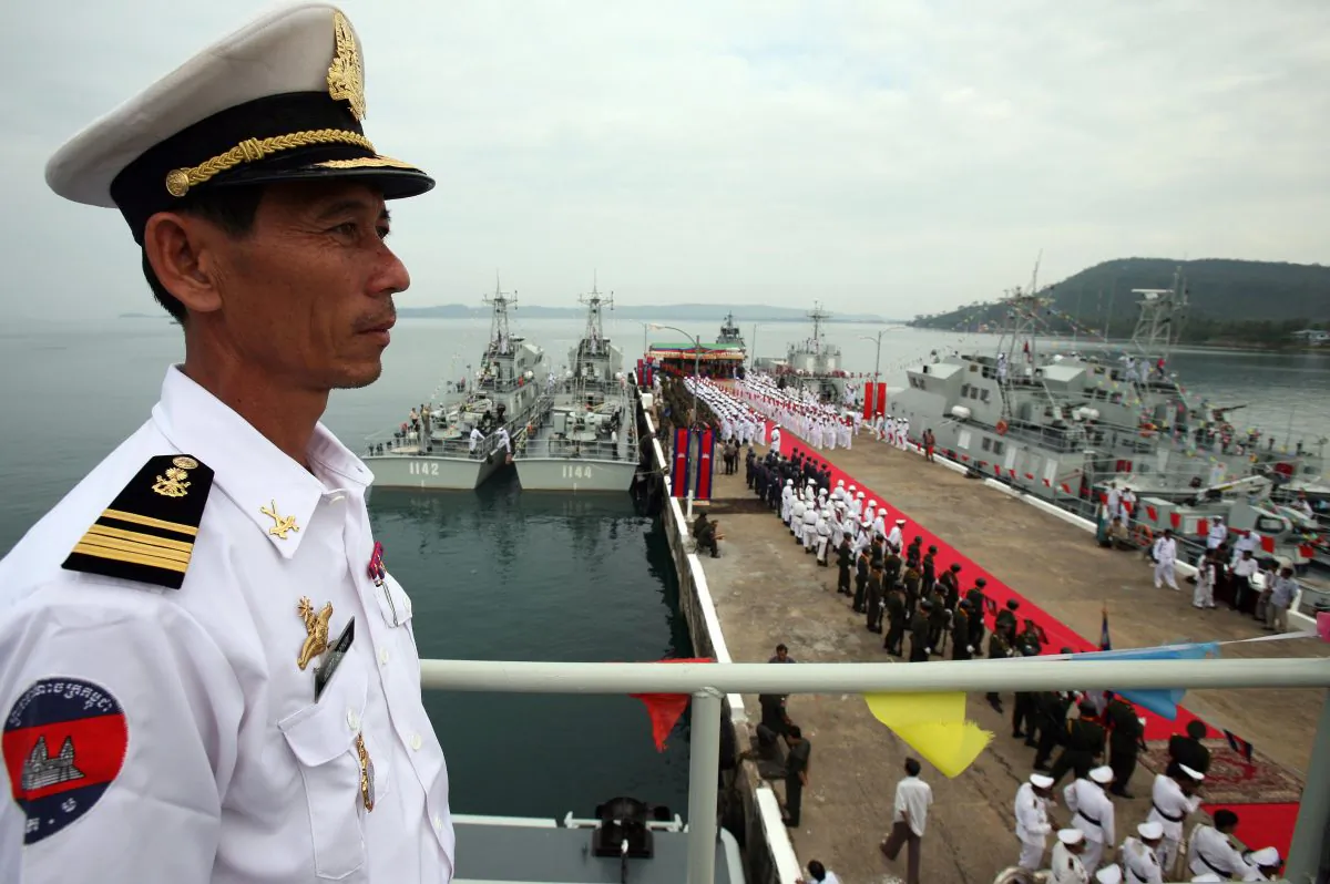 A Cambodian naval personnel stands on a naval patrol boat during a ceremony for nine naval patrol boats that were donated by China, at the Cambodia Naval Base in Sihanoukville, some 220 kilometers south-west of Phnom Penh, on 07 November 2007. (TANG CHHIN SOTHY/AFP/Getty Images)