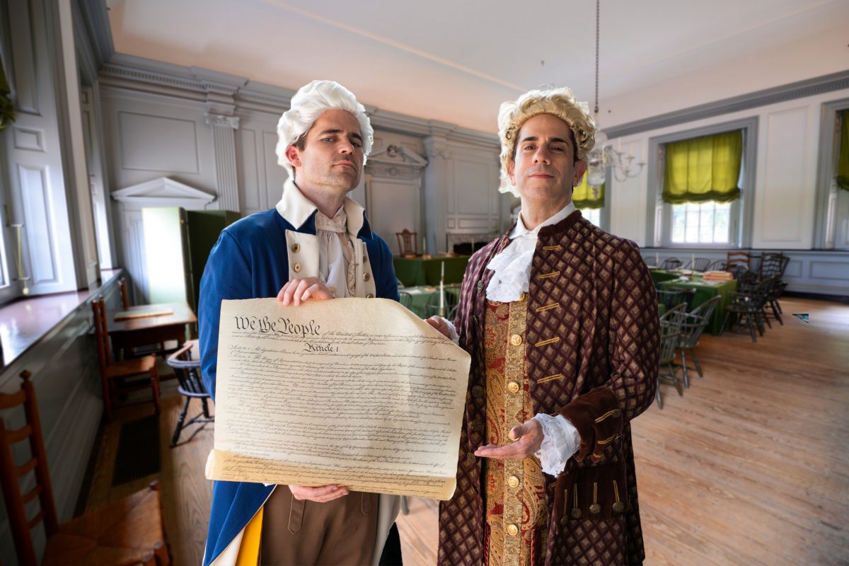 Dustin Bass (L) as George Washington and Alan Wakim as John Adams. (Sons of History)