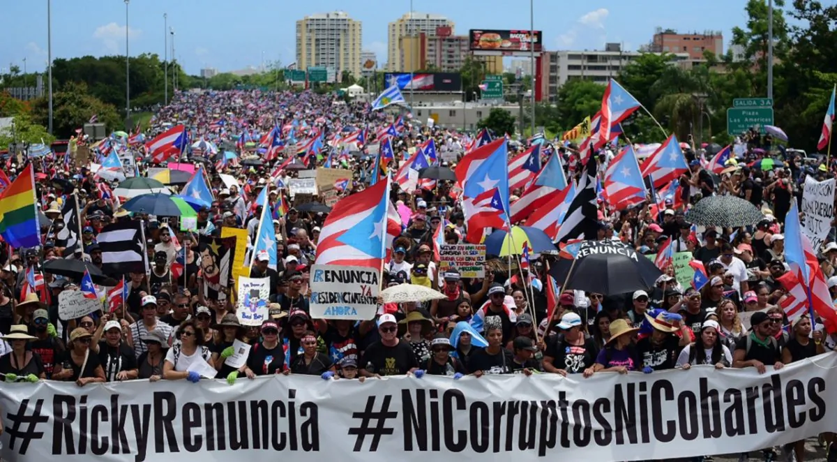 Thousands of Puerto Ricans gather for what many are expecting to be one of the biggest protests ever seen in the U.S. territory, with irate islanders pledging to drive Gov. Ricardo Rossello from office, in San Juan, Puerto Rico, on July 22, 2019. (Carlos Giusti/AP Photo)