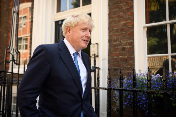 Boris Johnson leaves his campaign headquarters