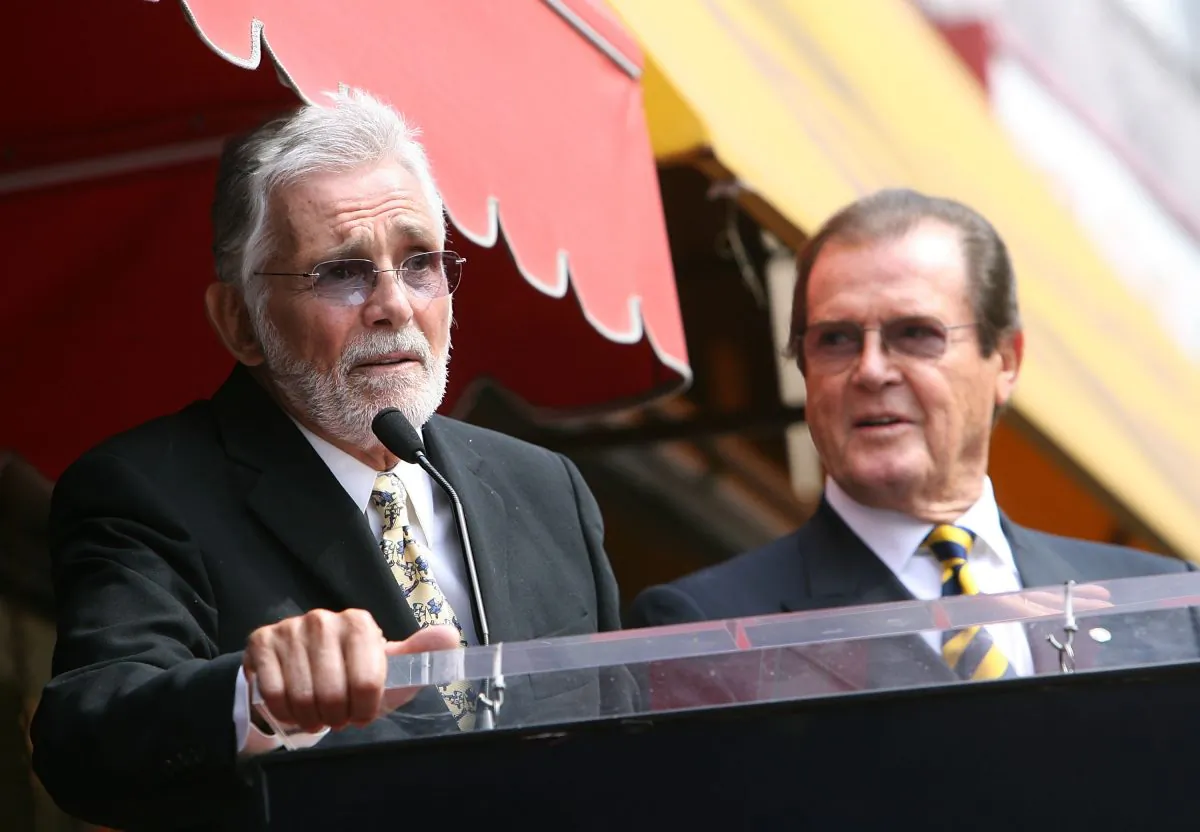 Actor David Hedison (L) speaks as British actor Sir Roger Moore (R) is honored with a Star on the Hollywood Walk of Fame in Hollywood, California, on Oct. 11, 2007. (Michael Buckner/AFP/Getty Images)
