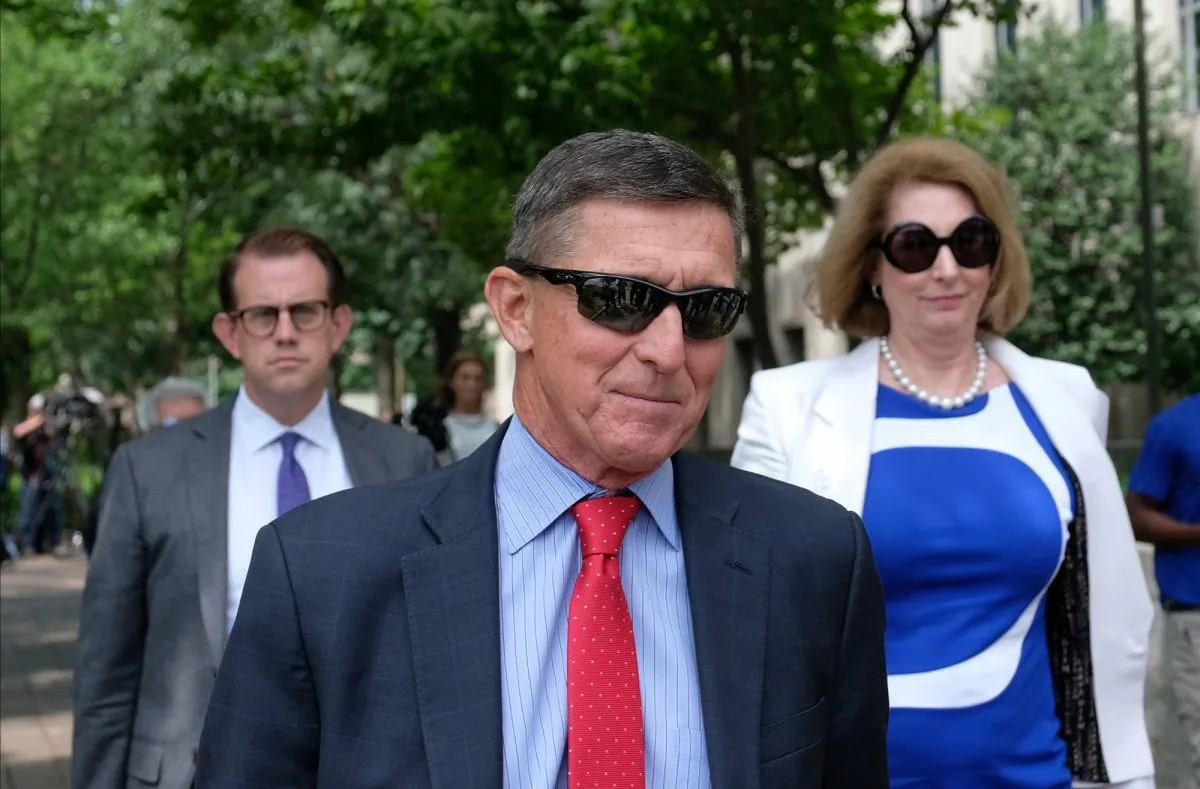 Michael Flynn and his lawyer, Sidney Powell, leave the E. Barrett Prettyman U.S. Courthouse in Washington on June 24, 2019. (Alex Wroblewski/Getty Images)