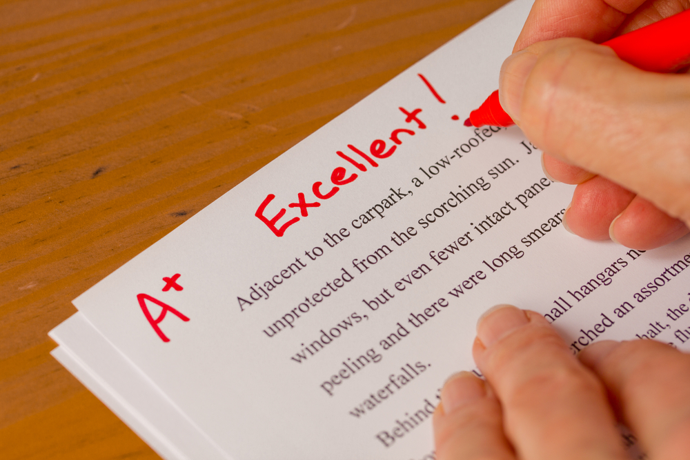 I remembered the glowing paragraphs of praise she wrote in bright red ink at the top of all my papers. (Pixsooz/Shutterstock)