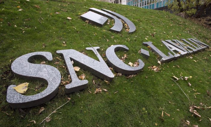 The front lawn of the headquarters of SNC Lavalin in Montreal in a file photo. The infrastructure and engineering firm announced a major restructuring on July 22, 2019. (The Canadian Press/Paul Chiasson)
