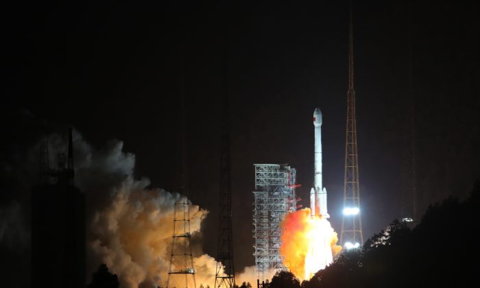 A Long March-3B carrier rocket carrying the 24th and 25th Beidou navigation satellites takes off from the Xichang Satellite Launch Center in Xichang, China on Nov. 5, 2017. China launched the two third-generation Beidou satellites with the purpose of supporting its global navigation and positioning network. (Wang Yulei/China News Service/VCG via Getty Images)