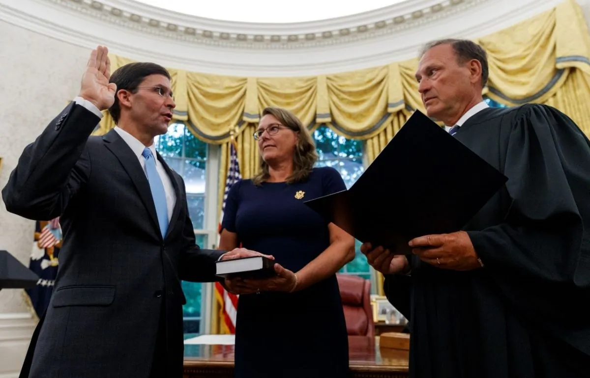 Mark Esper, left, is sworn in as the Secretary of Defense by Supreme Court Justice Samuel Alito, right, at the White House in Washington, on July 23, 2019. (Carolyn Kaster/AP Photo)