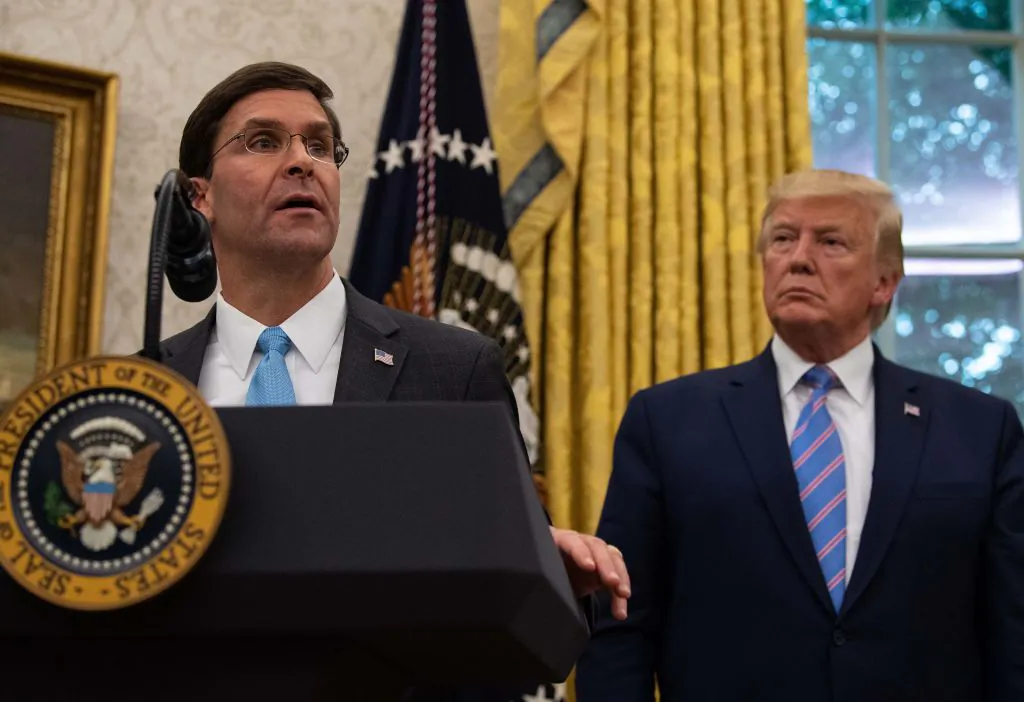 US Defense Secretary Mark Esper speaks after he was sworn in as President Donald Trump looks on in the Oval Office at the White House in Washington, on July 23, 2019. (Nicholas Kamm/AFP/Getty Images)