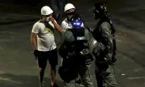 Why Hong Kong’s Chief Executive Didn’t Respond On the Morning After the Mob Attacks
