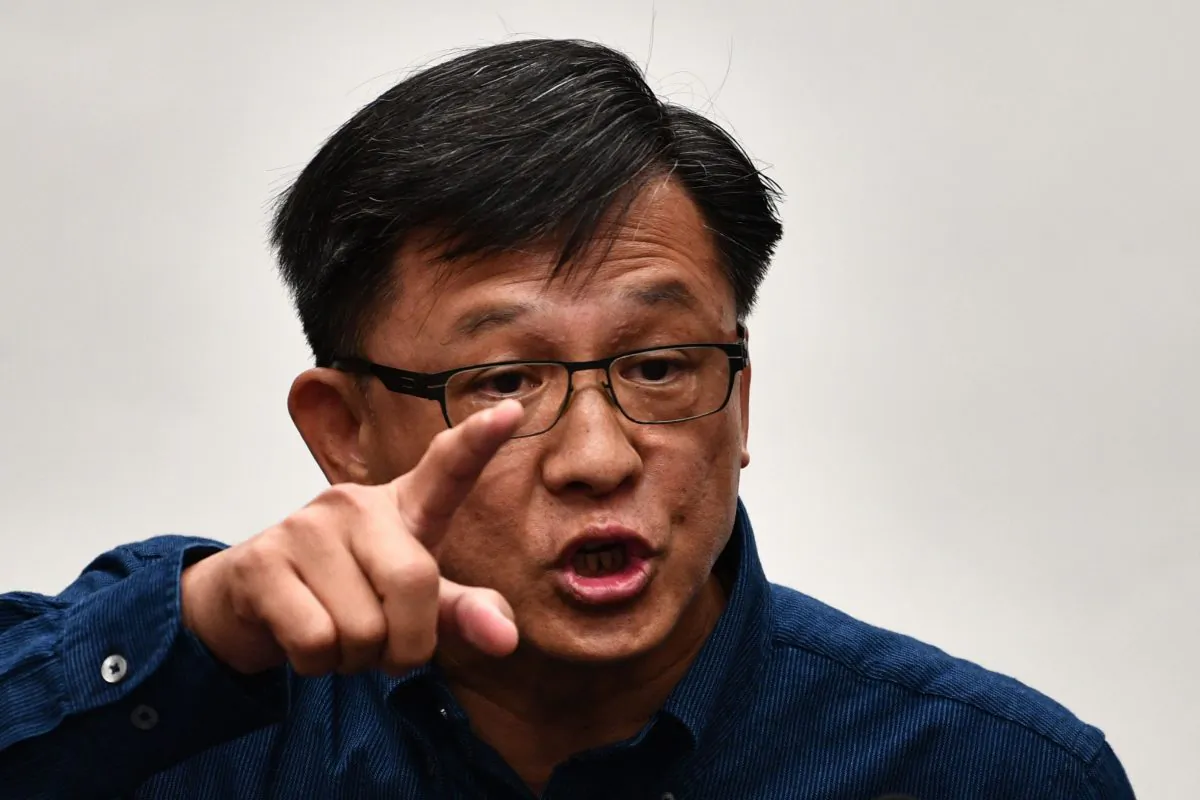 Pro-Beijing lawmaker Junius Ho speaks during a press conference in a meeting room of the Legislative Council in Hong Kong on July 22, 2019. (ANTHONY WALLACE/AFP/Getty Images)