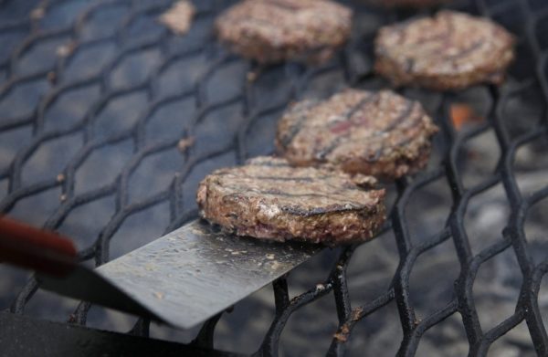 Hamburgers on a grill. 