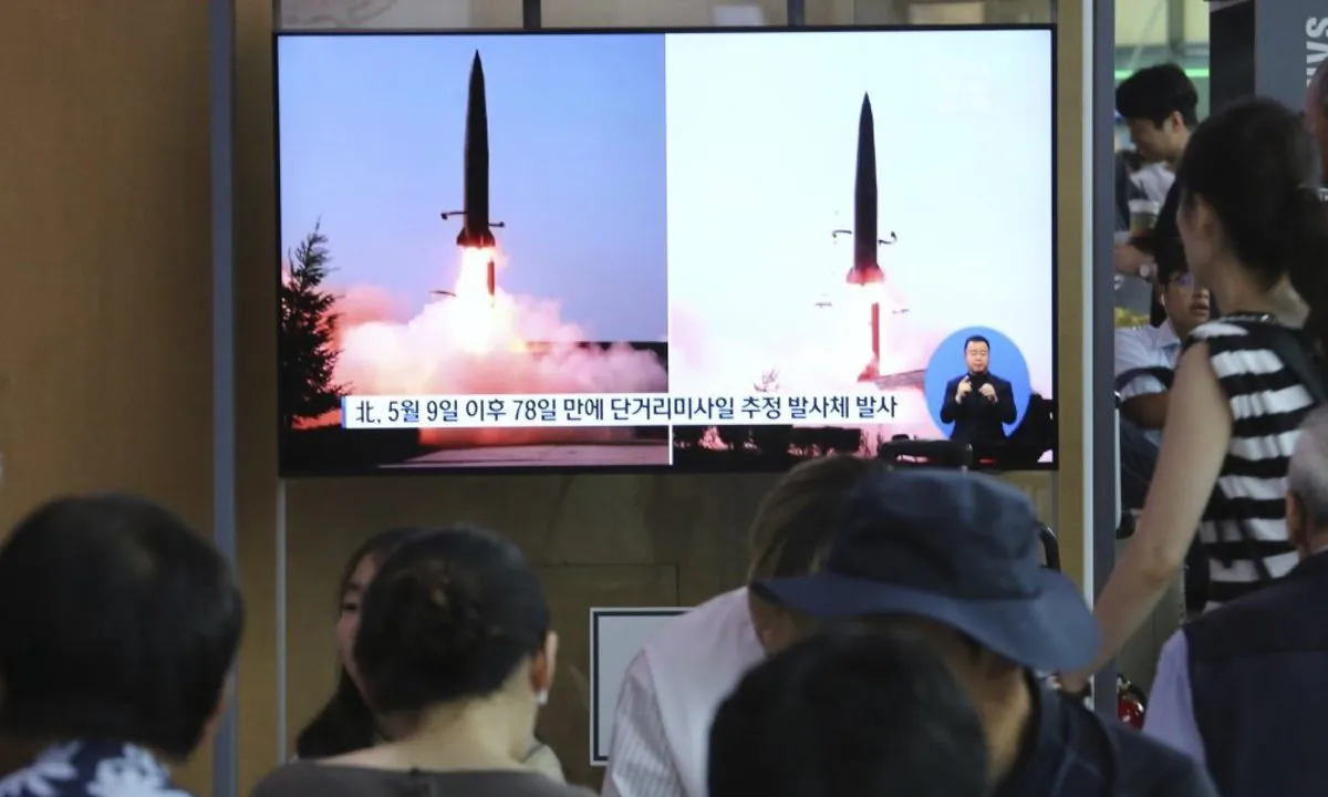 People watch a TV showing file images of North Korea's missile launch during a news program at the Seoul Railway Station in Seoul, South Korea, on July 25, 2019. (Ahn Young-joon/AP Photo)