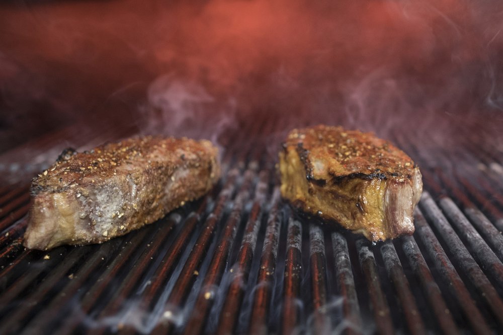 Steaks on a grill in New York. (Mary Altaffer, File/AP Photo)