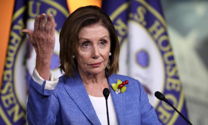 Speaker of the House Nancy Pelosi (D-Calif.) holds her weekly press conference at the U.S. Capitol Visitors Center in Washington on July 26, 2019. (Chip Somodevilla/Getty Images)