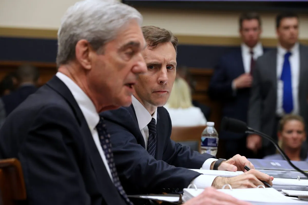 Former Deputy Special Counsel Aaron Zebley (R) listens to former Special Counsel Robert Mueller testify before the House Judiciary Committee on July 24, 2019. (Chip Somodevilla/Getty Images)