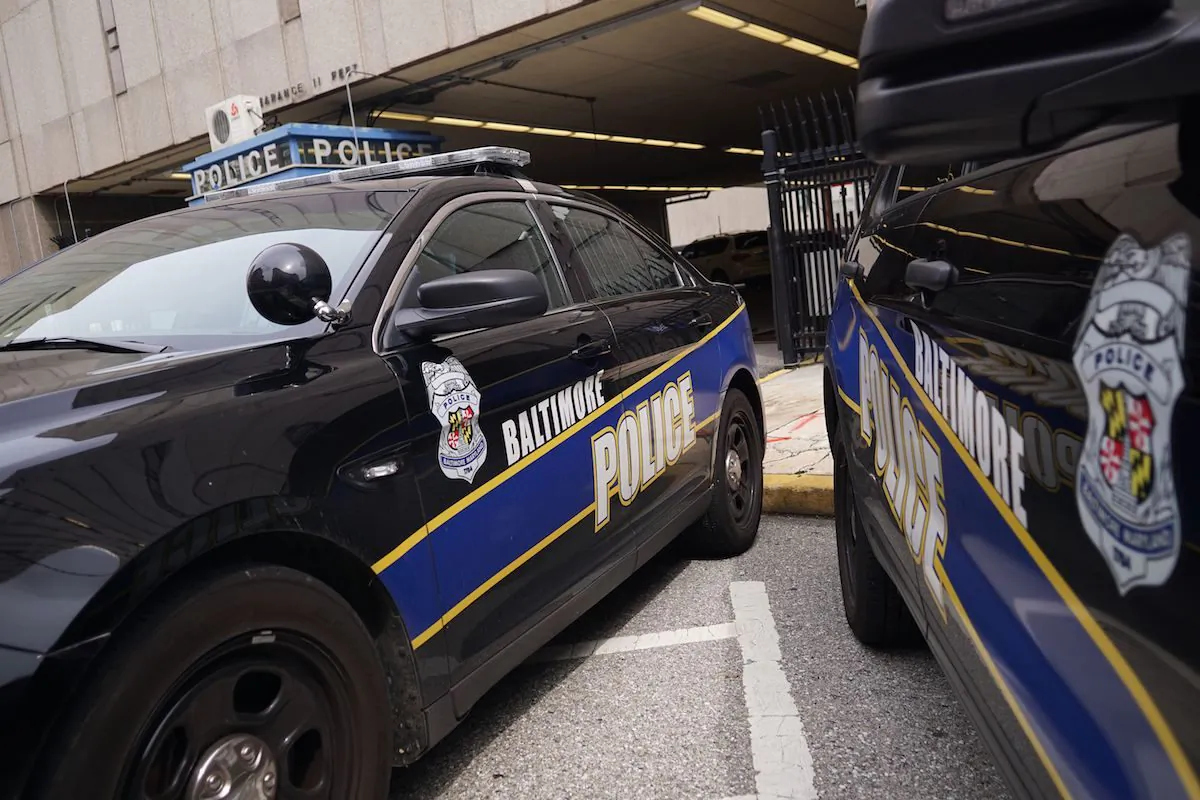 Police cars are seen outside of the Baltimore City Police Headquarters in Baltimore, Md., on Aug. 8, 2017. (Mandel Ngan/AFP/Getty Images)