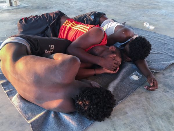 rescued migrants capsized boat