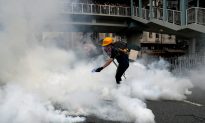 Police Fire Tear Gas in Clash With Hong Kong Protesters Over Banned March