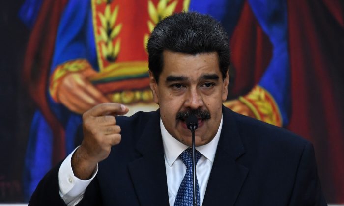 Venezuelan regime leader Nicolas Maduro speaks at the presidential palace in Caracas on June 27, 2019. (Yuri Cortez/AFP/Getty Images)