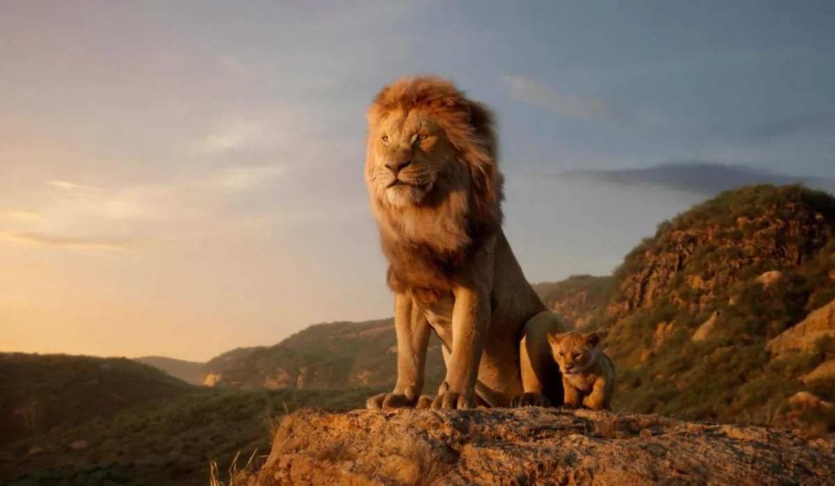 Mufasa (L) voiced by James Earl Jones, and young Simba, voiced by JD McCrary, in a scene from "The Lion King." (Disney via AP)