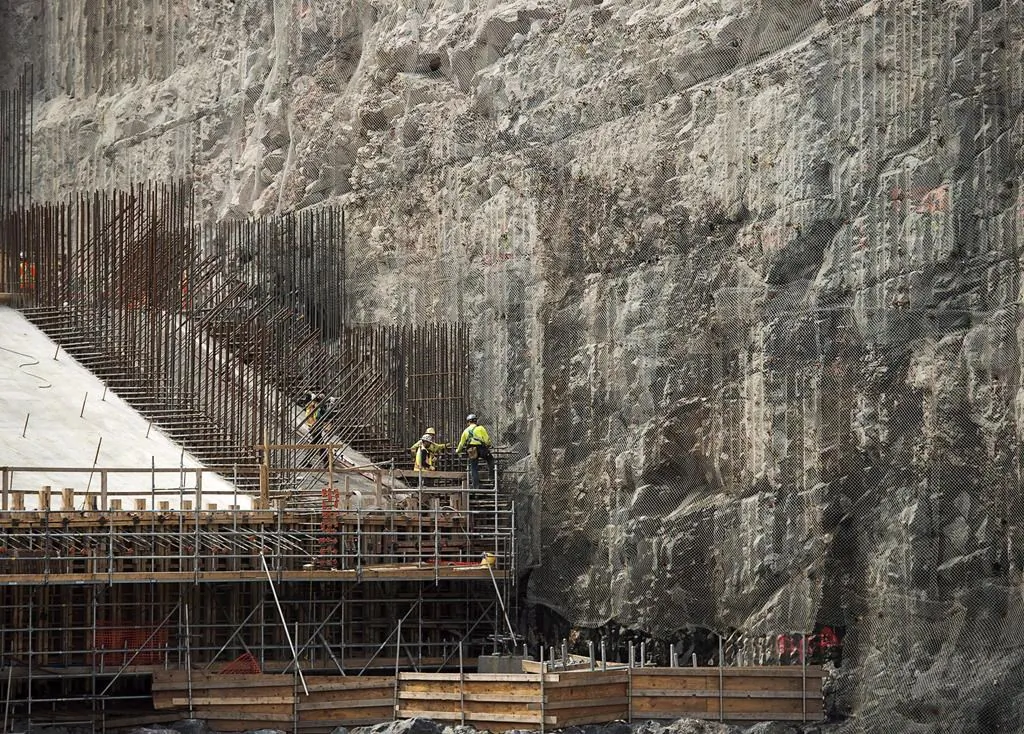 The construction site of the hydroelectric facility at Muskrat Falls, Newfoundland and Labrador is seen on Tuesday, July 14, 2015. The $12.7-billion Muskrat Falls hydroelectric dam in Labrador is finally nearing completion, billions of dollars over budget and years behind schedule. (Andrew Vaughan/The Canadian Press)