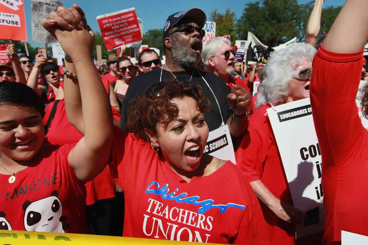 Striking Chicago teachers and their supporters attend a rally at Union Park September 15, 2012 in Chicago, Ill. Scott Olson/Getty Images)