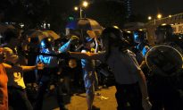 New Protest Erupts as Hong Kong Charges 44 Activists With Rioting