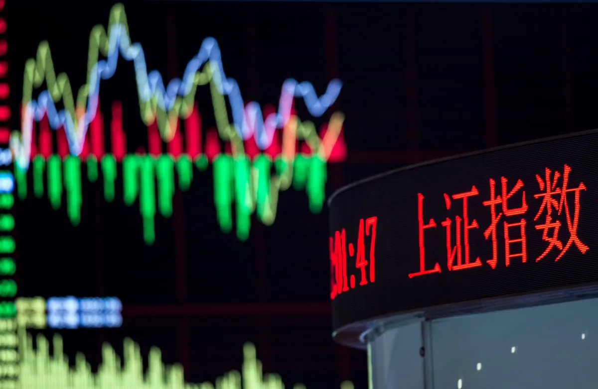 A board shows the stock movements inside the Shanghai Stock Exchange in the Lujiazui financial district of Shanghai, China on Sept. 22, 2015. (Johannes EiseleAFP/Getty Images)