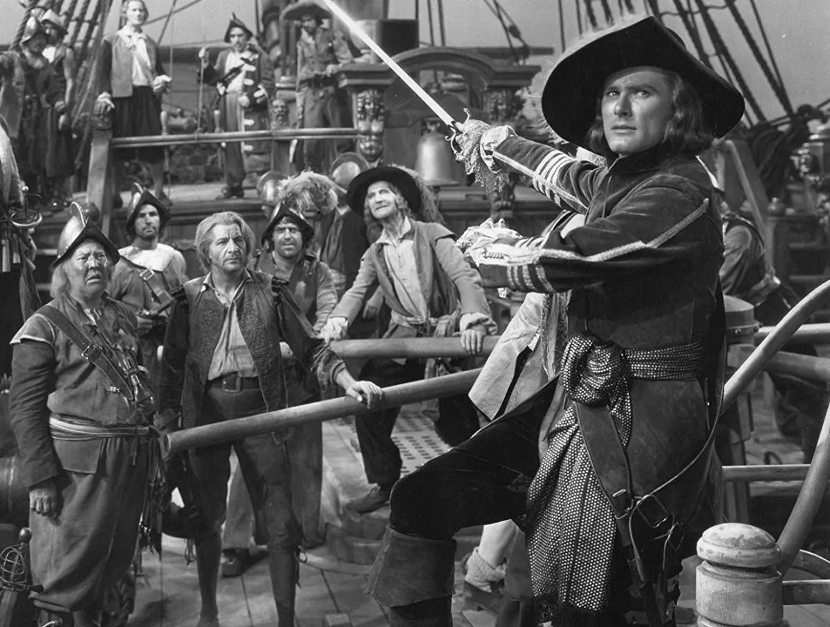Errol Flynn (R) as Peter Blood in the 1935 film, “Captain Blood.” (Warner Bros.) 