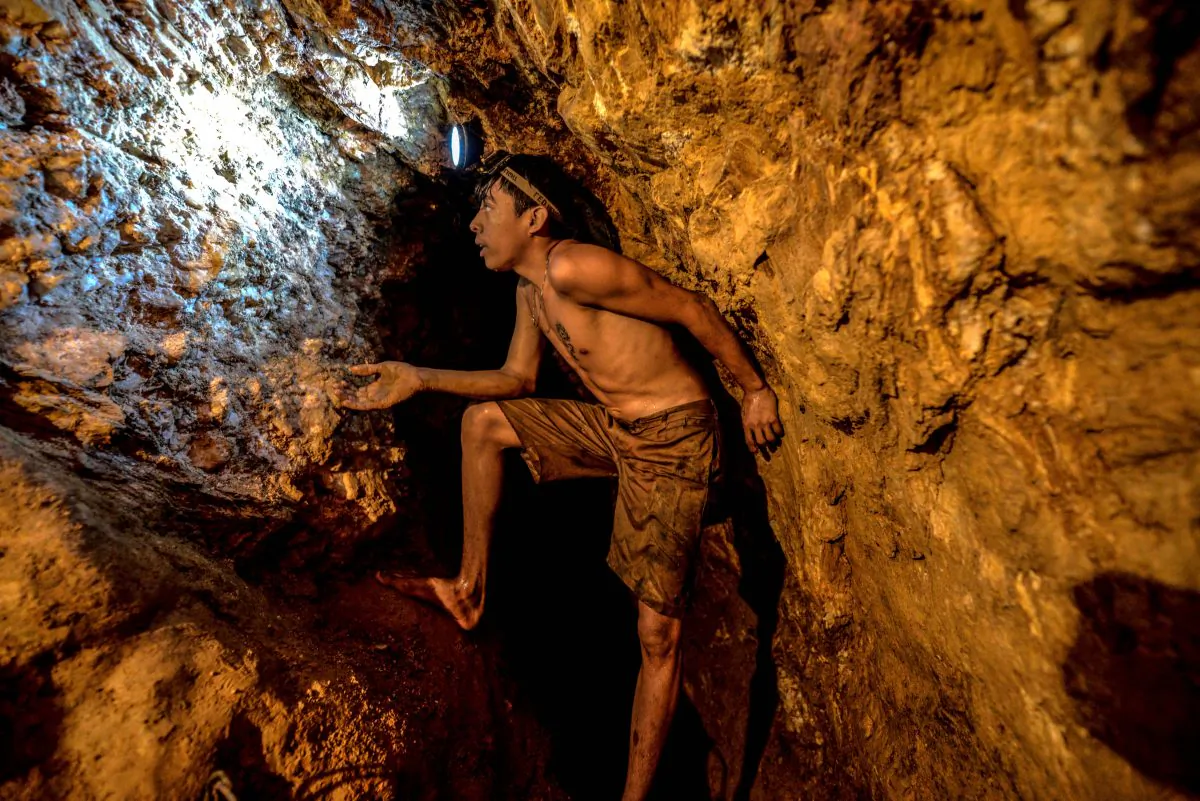 Ender Moreno looks for gold at La Culebra gold mine in El Callao, Bolivar state, southeastern Venezuela, on March 1, 2017. (Juan Barreto/AFP/Getty Images)