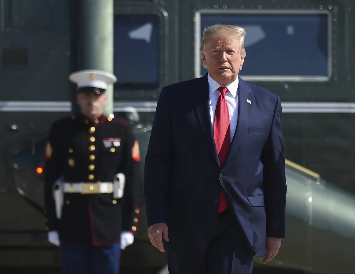 President Donald Trump walks to Air Force One as he departs Joint Airbase Andrews, Md., on July 30, 2019. (Andrew Caballero-Reyholds/AFP/Getty Images)