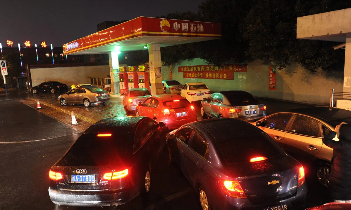 A crowded gas station in China. (STR/AFP/Getty Images)